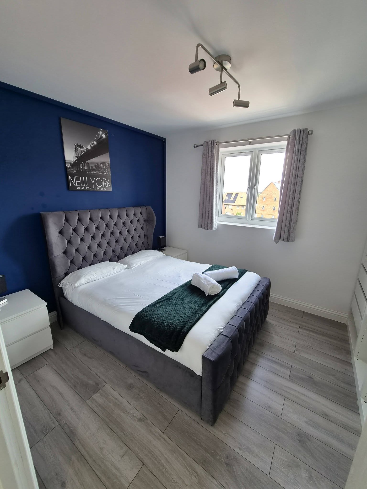 A spotlessly clean modern apartment representing high-standard Airbnb presentation